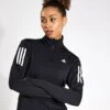 ADIDAS Own The Run Half-Zip Jacket - Black 1 ADIDAS Own The Run Half-Zip Jacket - Black -The Sports Edit Adidas OWN THE RUN B HALF ZIP IK7440 BLACK 0007