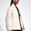 Varley Reno Reversible Quilt Jacket - Sandshell 1 Varley Reno Reversible Quilt Jacket - Sandshell -The Sports Edit Varley reno reversible quilt jacket VAR01746 SAND sandshell 0026