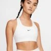 Nike Dri-FIT Swoosh Sports Bra - White/Black 2 Nike Dri-FIT Swoosh Sports Bra - White/Black -The Sports Edit nike dri fit swoosh sports bra white black BV3636 100 1