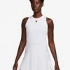 NikeCourt Slam Dri-FIT Tennis Dress - White 1 NikeCourt Slam Dri-FIT Tennis Dress - White -The Sports Edit nike nikecourt slam dri fit tennis dress white fz6746 100 1