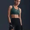 Nike Swoosh Medium Support Bra - Vintage Green/White -The Sports Edit nike swoosh medium support bra green white dx6821 338 1