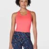 Sweaty Betty Athlete Crop Seamless Gym Vest - Coral Pink -The Sports Edit sweaty betty athlete crop seamless gym vest coral pink sb6545c 1