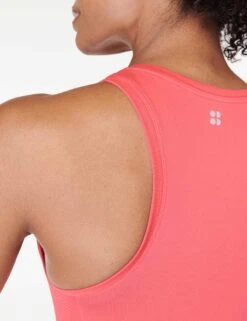 Sweaty Betty Athlete Crop Seamless Gym Vest - Coral Pink 12 Sweaty Betty Athlete Crop Seamless Gym Vest - Coral Pink -The Sports Edit sweaty betty athlete crop seamless gym vest coral pink sb6545c 3