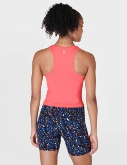 Sweaty Betty Athlete Crop Seamless Gym Vest - Coral Pink 10 Sweaty Betty Athlete Crop Seamless Gym Vest - Coral Pink -The Sports Edit sweaty betty athlete crop seamless gym vest coral pink sb6545c 6