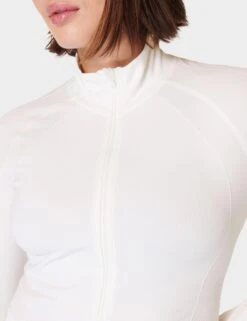 Sweaty Betty Athlete Crop Seamless Gym Zip Up - Lily White 10 Sweaty Betty Athlete Crop Seamless Gym Zip Up - Lily White -The Sports Edit sweaty betty athlete crop seamless gym zip up lily white sb9288 6