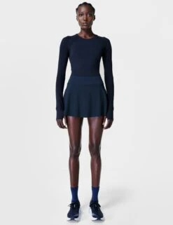 Sweaty Betty Athlete Seamless Workout Long Sleeve Top - Navy 11 Sweaty Betty Athlete Seamless Workout Long Sleeve Top - Navy -The Sports Edit sweaty betty athlete seamless gym long sleeve top navy blue sb6547 2
