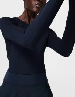 Sweaty Betty Athlete Seamless Workout Long Sleeve Top - Navy 9 Sweaty Betty Athlete Seamless Workout Long Sleeve Top - Navy -The Sports Edit sweaty betty athlete seamless gym long sleeve top navy blue sb6547 3
