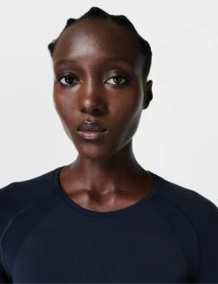 Sweaty Betty Athlete Seamless Workout Long Sleeve Top - Navy 10 Sweaty Betty Athlete Seamless Workout Long Sleeve Top - Navy -The Sports Edit sweaty betty athlete seamless gym long sleeve top navy blue sb6547 4