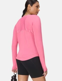 Sweaty Betty Breathe Easy Mesh Long Sleeve Top - Lollipop Pink 9 Sweaty Betty Breathe Easy Mesh Long Sleeve Top - Lollipop Pink -The Sports Edit sweaty betty breathe easy mesh ls top lollipop pink sb9911 6