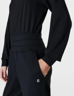 Sweaty Betty Gaia Yoga Long Sleeve Jumpsuit - Black 12 Sweaty Betty Gaia Yoga Long Sleeve Jumpsuit - Black -The Sports Edit sweaty betty gaia yoga long sleeve jumpsuit black sb9727 4