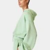 Sweaty Betty Sand Wash Cloud Weight Crop Hoody - Butter Green -The Sports Edit sweaty betty sand wash cloud weight crop hoody butter green sb9401 1