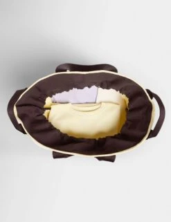 Sweaty Betty SB Canvas Bucket Bag - Buttercream Yellow -The Sports Edit sweaty betty sb canvas bucket bag buttercream yellow sb10224 3