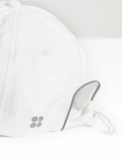 Sweaty Betty Swiftie Run Cap - White 9 Sweaty Betty Swiftie Run Cap - White -The Sports Edit sweaty betty swiftie run cap white sb2218 4